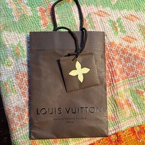 Louis Vuitton little brown gift bag.  10 x 8 x 2.5